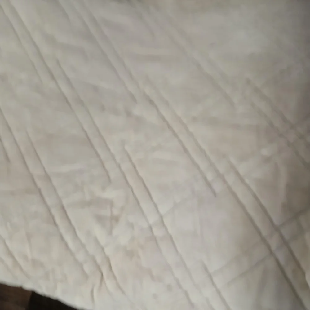 Cozy Quilted Sofa Cover in Beige